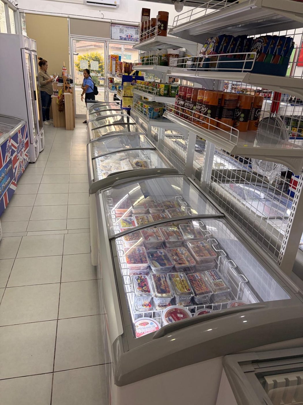 Aisle of frozen food and shelves of expat foods in Thailand